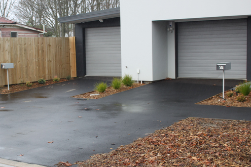 Asphalt driveway and vehicle crossing